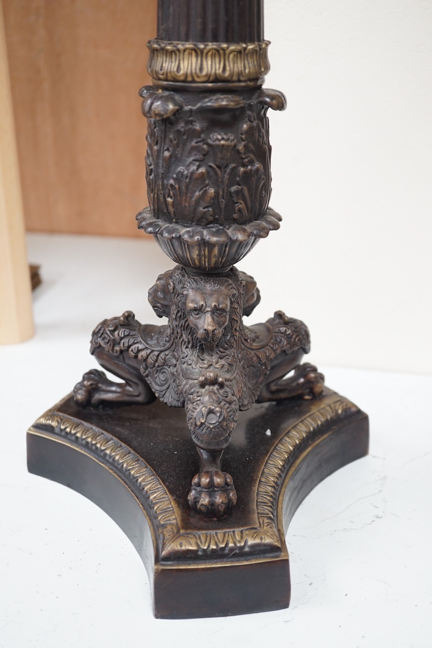 A pair of Empire style bronze candelabra, 71cm tall